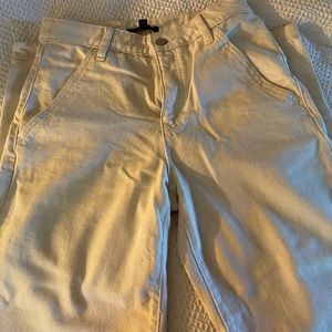 Cream jeans with a regular/baggy fit.